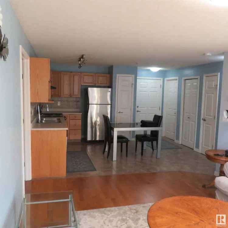 Buy Condo in Hollick Kenyon Community with 2 Bedrooms and Patio