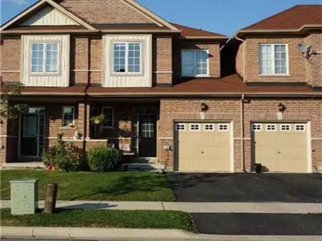 Incredible 3-Bedroom Townhome with Upgrades and Ravine View