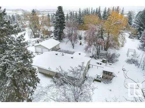 Commercial Land for Sale in Edmonton: 3.02 Acres with Quonset & Bungalow