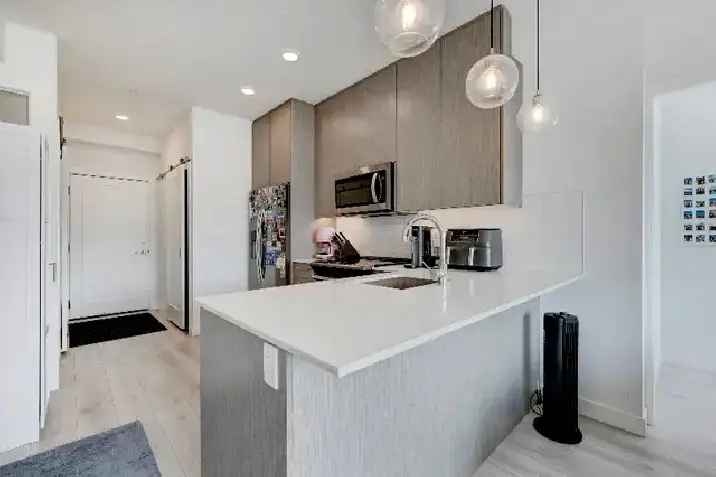 MODERN 3 BEDROOM CORNERSTONE CONDO WITH 2 PARKING STALLS!