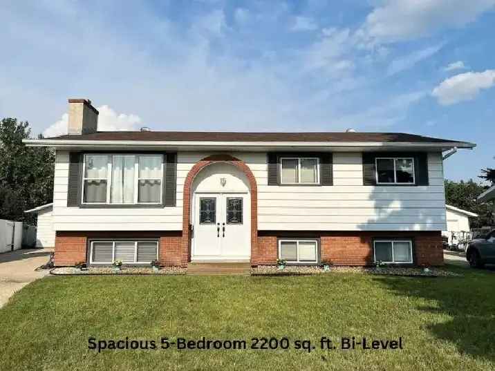 Spacious Bi-level home - 5 bedrooms, 3 bathrooms, 2 kitchens