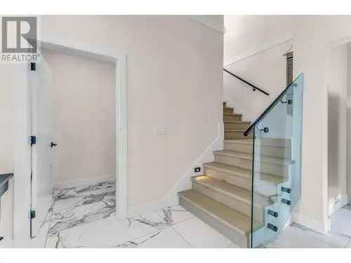 7 Bedroom Home with Rooftop Patio and Panoramic Views in Black Mountain Kelowna