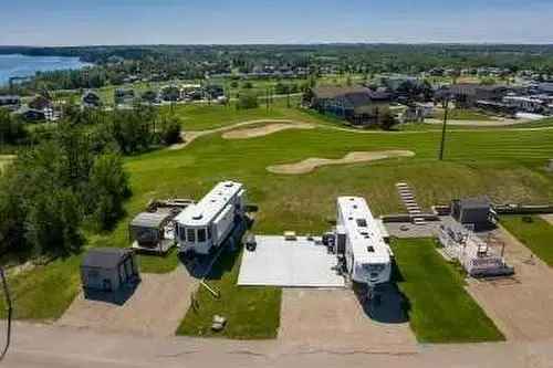 Buy Condo in Rural Red Deer County Alberta with Lake Access and Amenities