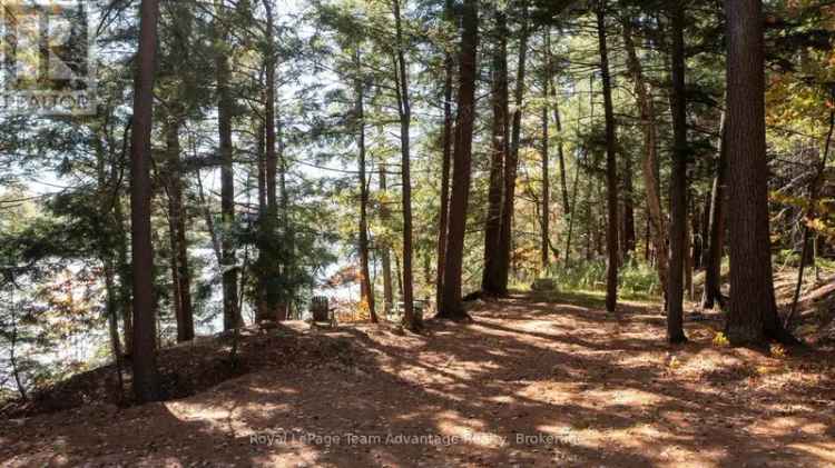 5.8 Acre Waterfront Lot on Wahwashkesh Lake