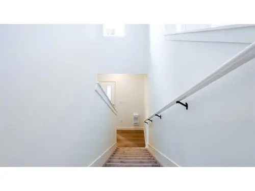 Buy Townhouse in Springbank Hill with Modern Features