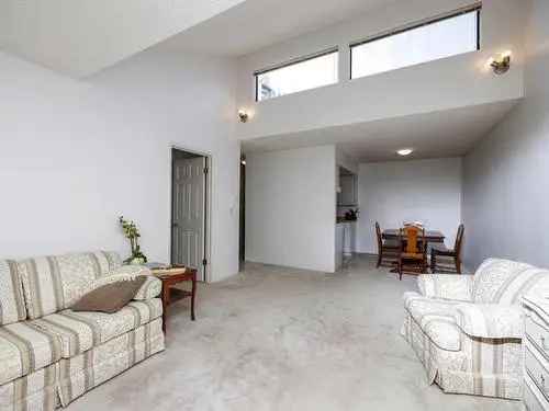 Central Lonsdale Gem: 1 Bed, 1 Bath Suite with Balcony