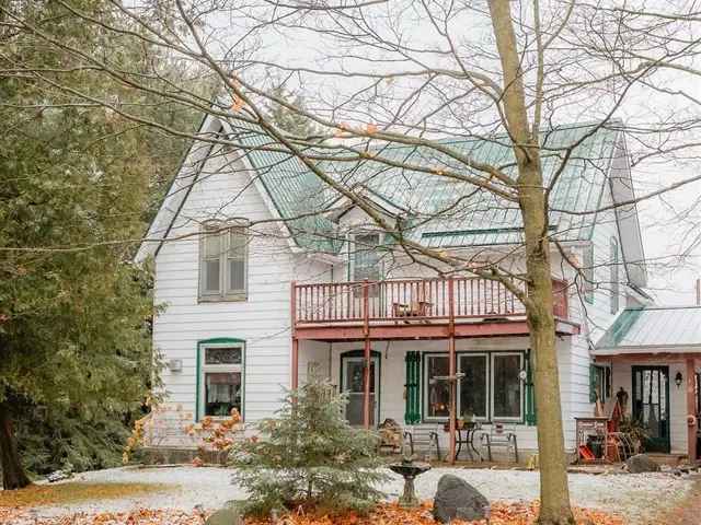 4-Bedroom Farmhouse on 40 Acres with Workshop and Barn