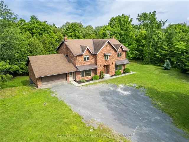 5000 Sq Ft Brick Manor on 4 Acres Backing onto Salmon River