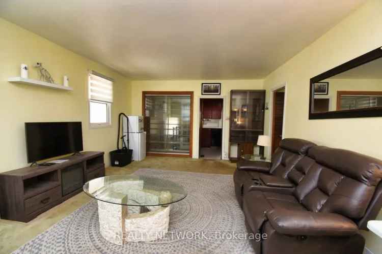 Roomy Bungalow Near QEW - High Basement - Ideal for Investors