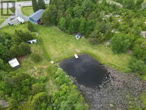 For Sale Raised Ranch in Greater Sudbury with 4.6 Acres of Privacy