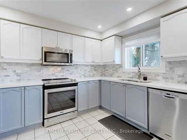 3 Bedroom Freehold Townhouse with Finished Basement and Backyard