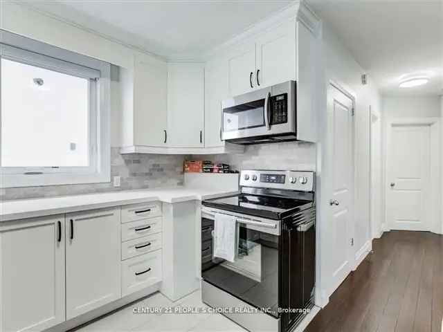 Renovated Bungalow in Stonegate-Queensway 2 Beds 2 Baths 3 Parking