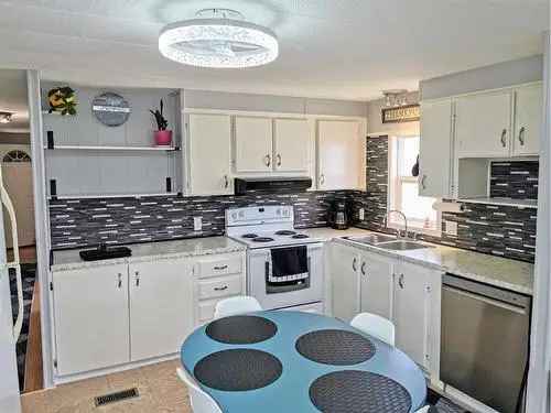 House For Sale in Normandeau Red Deer