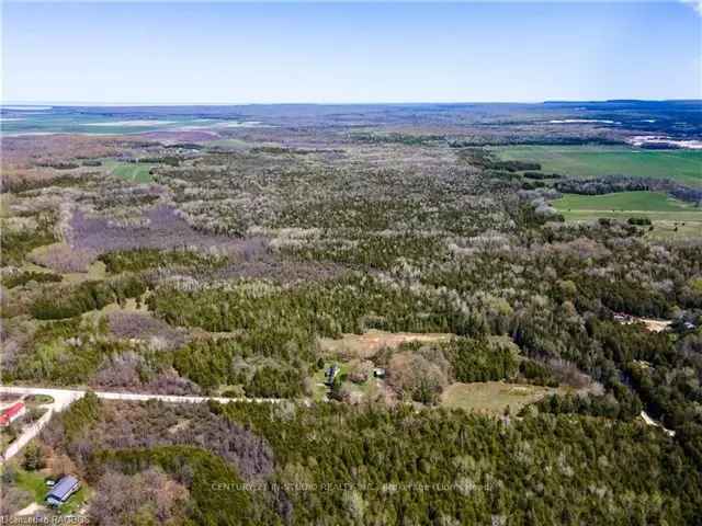 100-Acre Secluded Retreat with 4-Bedroom House and Rustic Barn