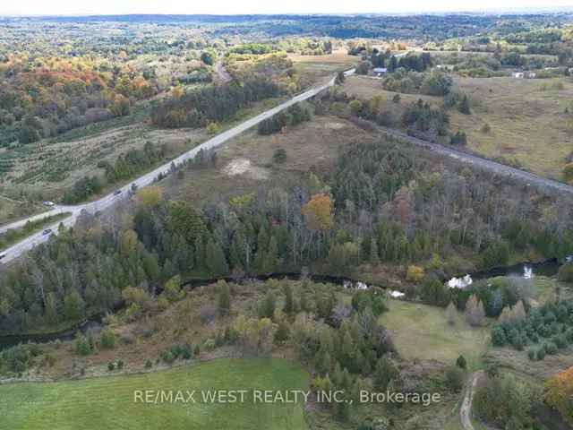 46.5-Acre Mixed Use Farm with Highway Frontage Barn Paddock Greenhouse