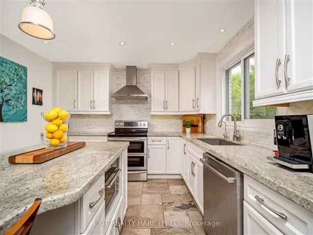 Luxury 5 Bed 7 Bath Home with In-Law Suite on Ravine Lot