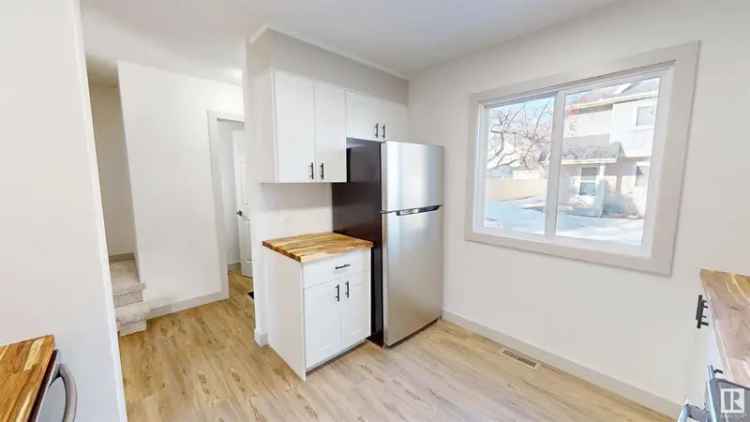 Buy Half Duplex in Mayfield Mews with Renovated Kitchen and Backyard