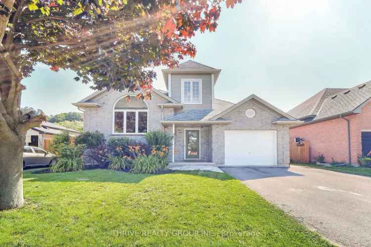 Buy raised ranch home in Port Stanley with hot tub and modern kitchen