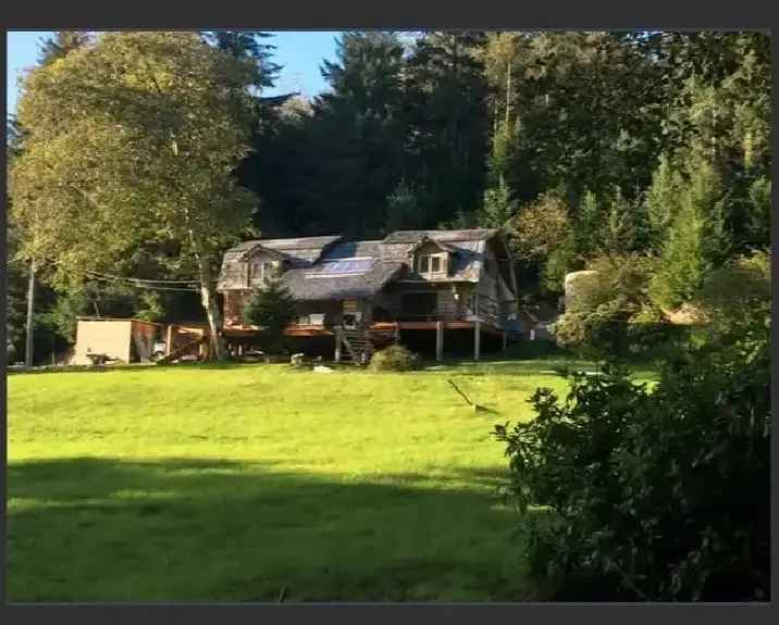 Log home on 50 acres - Haida Gwaii-worlds salmon fishing capital