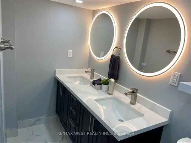 Stunning Newly Renovated 2 Bedroom Furnished Basement Apartment