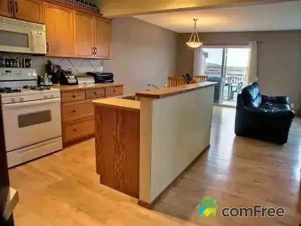 Main Floor Cochrane Home 2-Storey 3 Baths Double Garage
