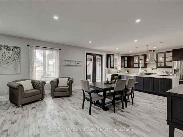 Mt Brydges Executive Home: 2-Storey, 8-Car Garage, Inground Pool