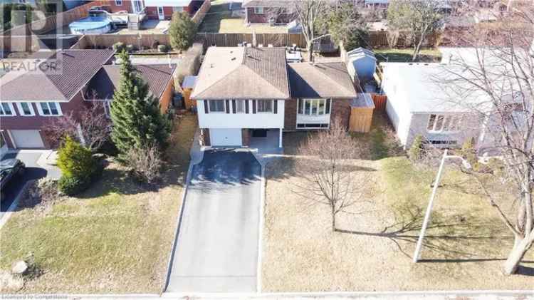 Burlington Detached Home: Renovated Kitchen, Heated Pool, & Finished Basement