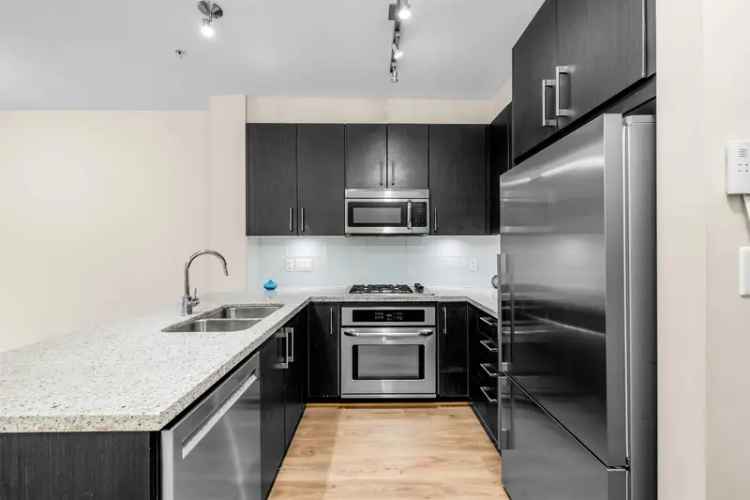 Central Lonsdale Condo 2 Beds 2 Baths 822 sq ft