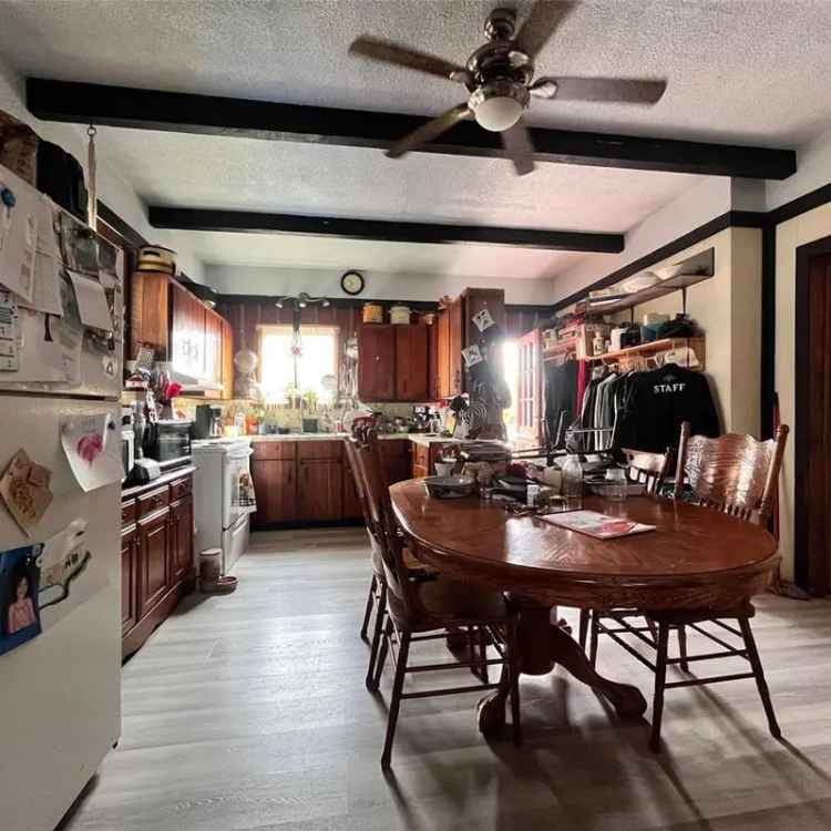 Unique Character Home with Detached Shop and Carriage House Potential