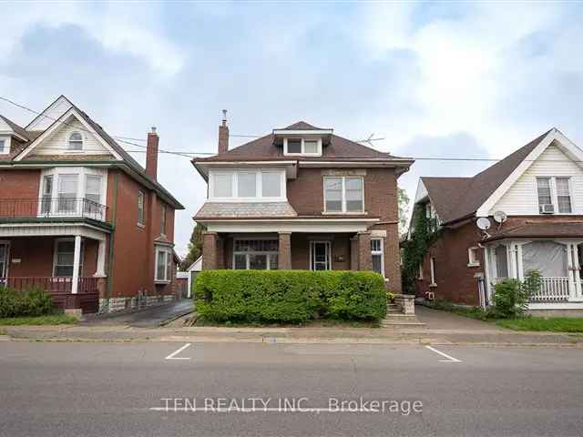 Historic Charm Duplex with Modern Updates and Large Workshop