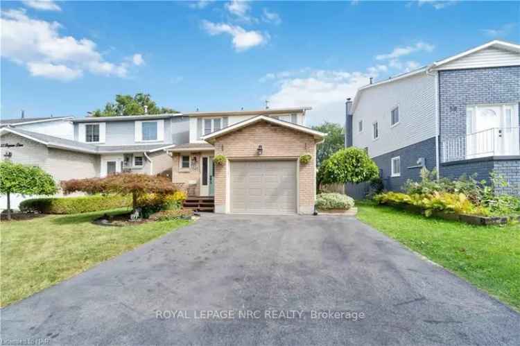 Buy 2 Story Brick Home with Deck and Hot Tub in Vibrant Community