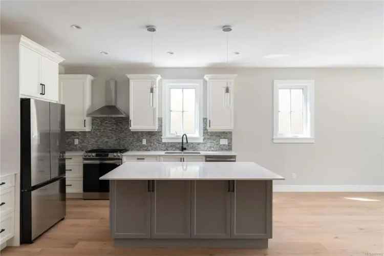 New 3-Bed 2-Bath Rancher Home with Gourmet Kitchen and Easy-Care Yard