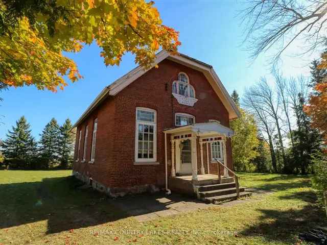 Old School House with Original Features and Private Lot