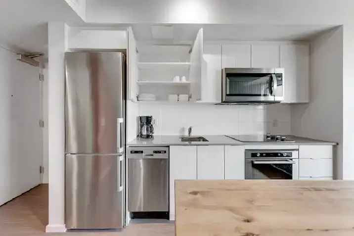 share one-bed private bath in 3-year new condo, near Carleton U