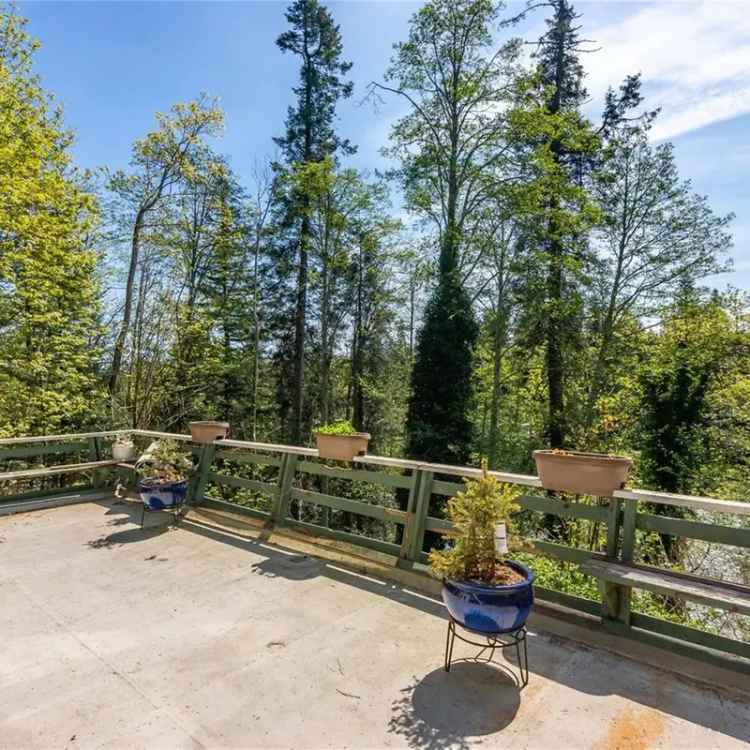 Riverfront Home on Two Half-Acre Lots in Campbell River
