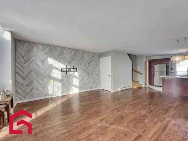 Two-Bedroom Semi-Detached House Near Highway 19 Laval