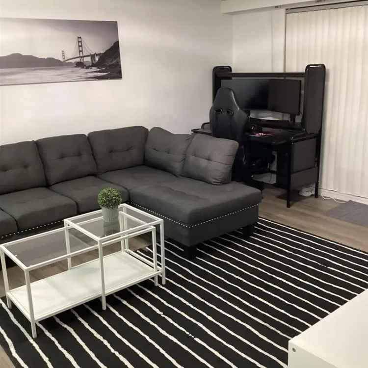 Fully Renovated 2-Bedroom Condo with 2 Parking Spots Near Queens Park