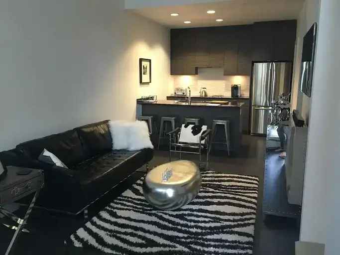 Rent Two Levels Condominium in Calgary with Two Patios and Modern Amenities