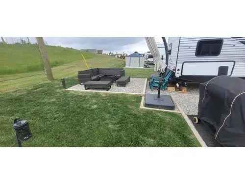 Buy Condo in Rural Red Deer County Alberta with Scenic Golf Course Views