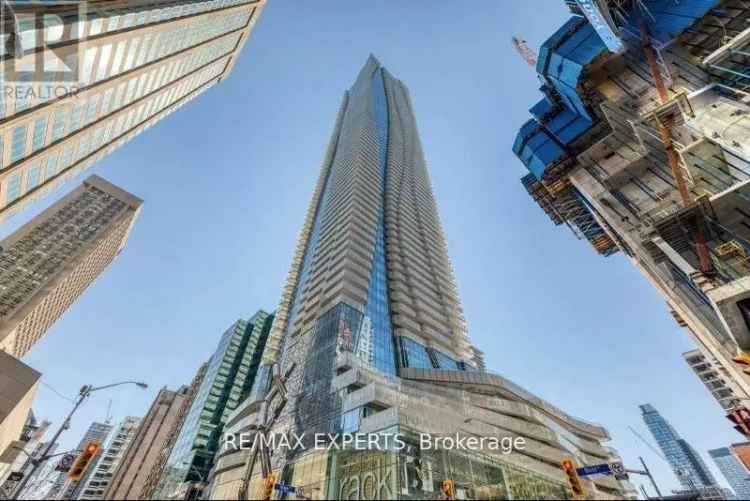 Buy Executive Condo at 1 Bloor St E in Downtown Toronto with Lake View