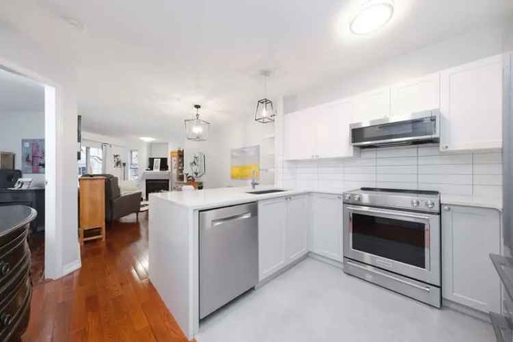 Lower Lonsdale Condo 1 Bed + Den - Renovated, City Views, Pet Friendly