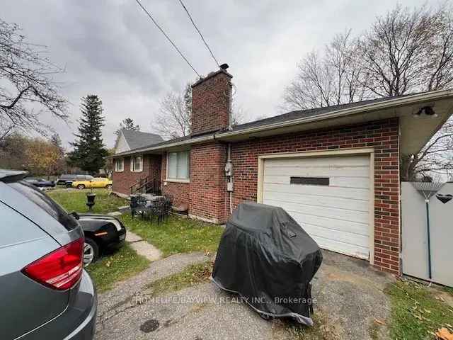 Buy all brick bungalow in Nobleton with spacious backyard and hardwood floors