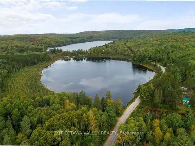 Lakefront Lot with Garage Septic Hydro and Well Near Boulter Lake