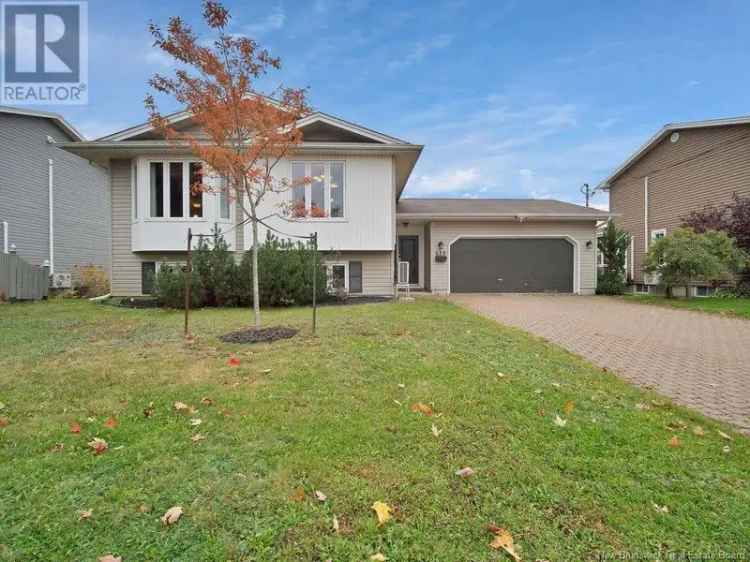 Dieppe 4-Bedroom Home with Double Garage and Private Backyard