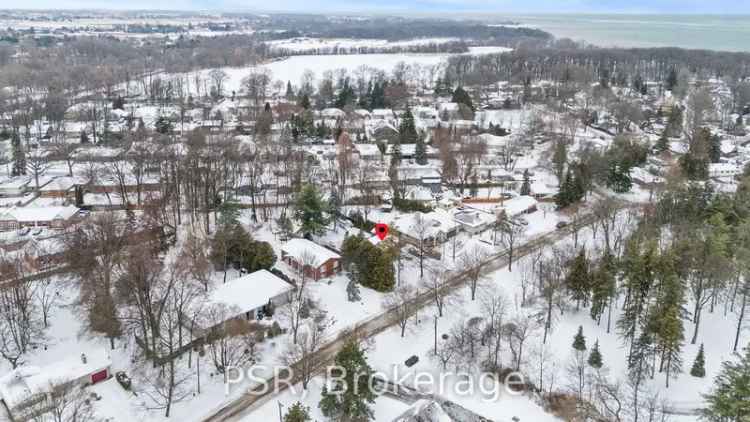 Buy Land in Niagara-on-the-Lake with Custom Home Potential and Mature Trees