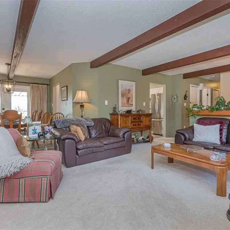 Lake View 4 Bed 3 Bath Home with Suite Potential