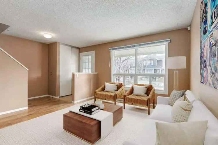 End Unit Townhouse for Sale with Backyard Near Fish Creek Park