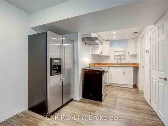 Modern 2-Bedroom Lower Unit with Private Backyard