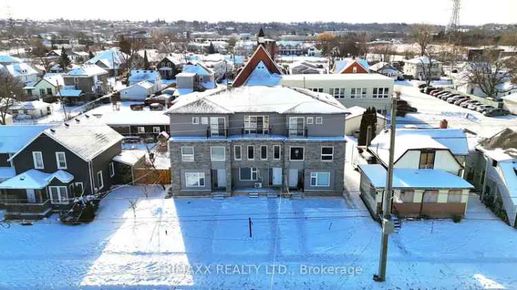 Buy Townhouse in Canada with Two Units and Modern Features