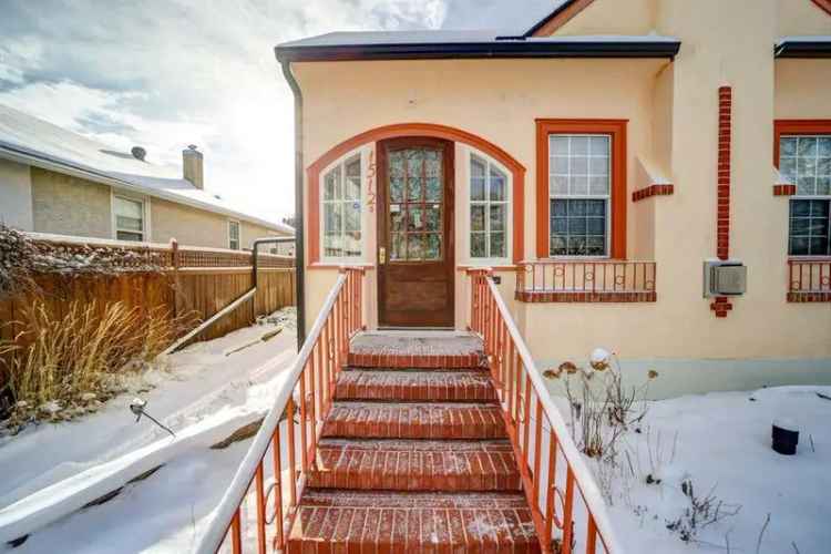 Buy cottage in Lethbridge with upgraded features and beautiful garden